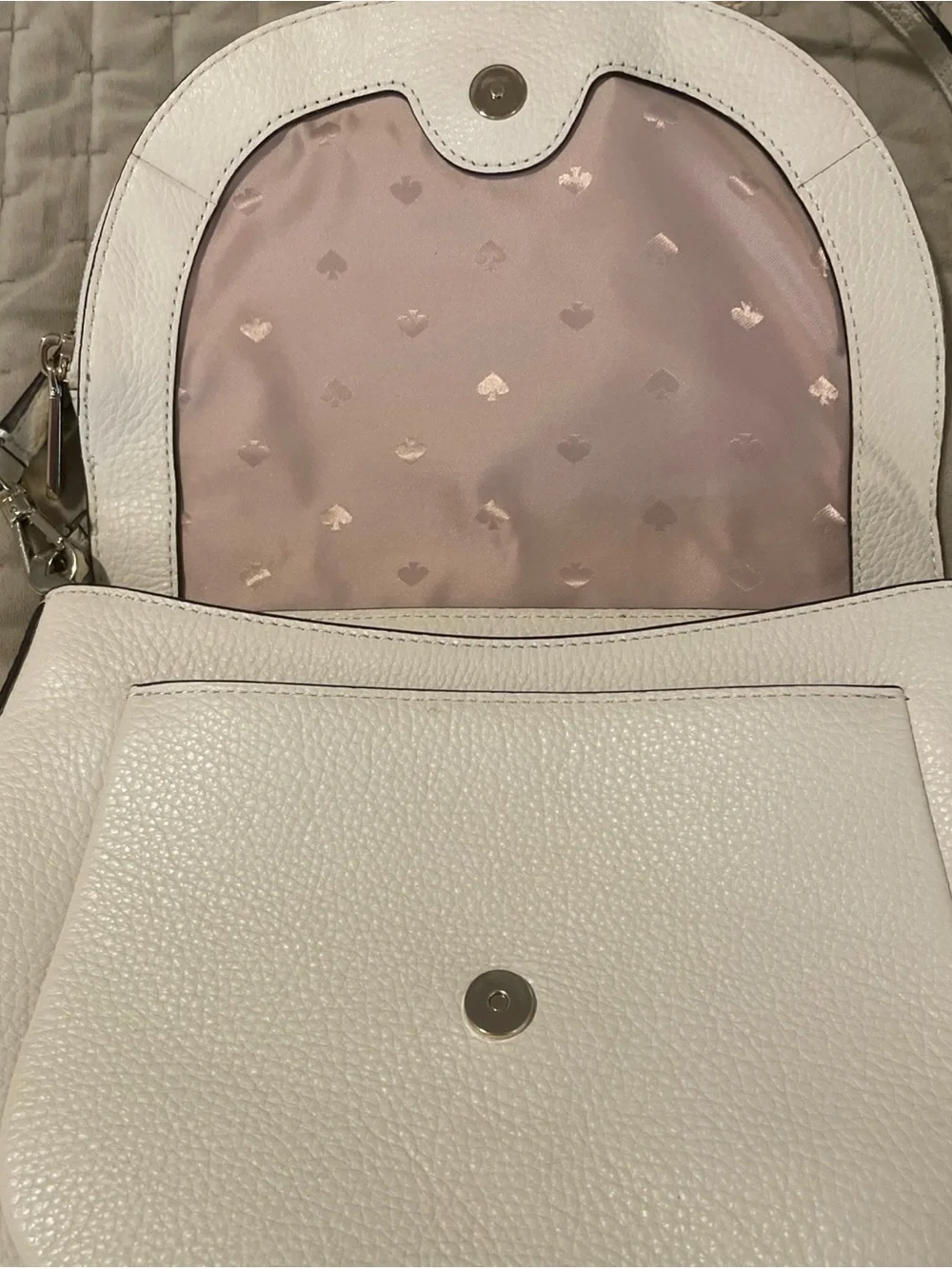 kate spade cream pebbled leather crossbody with gold logo